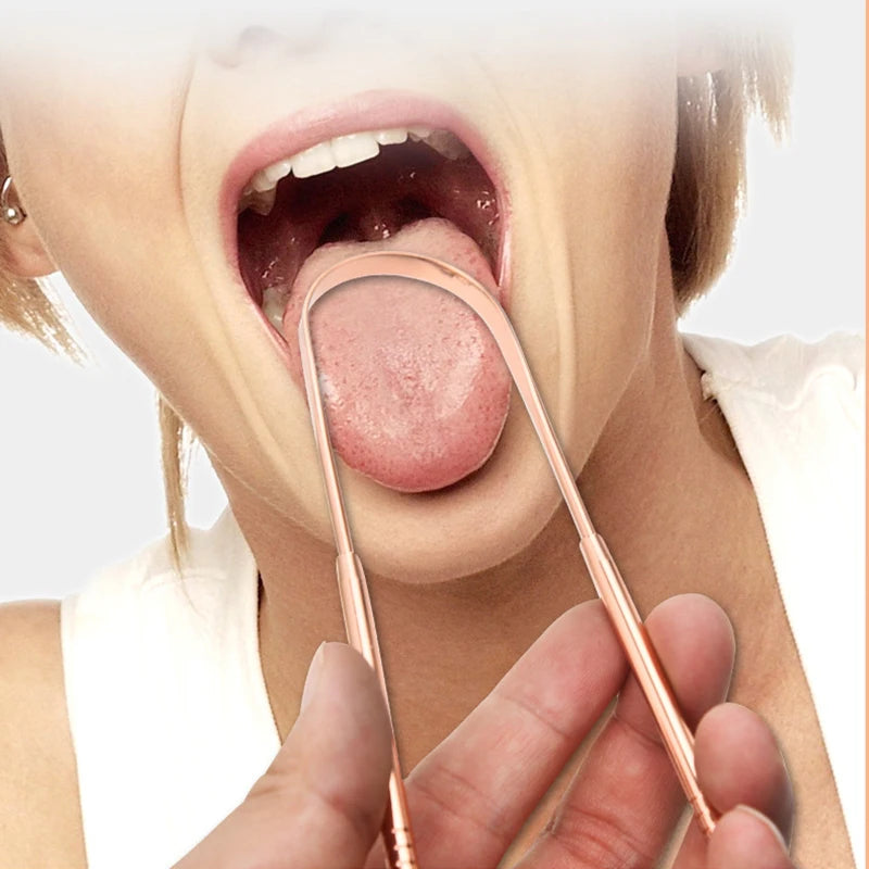 Auralis tongue scraper being used for effective tongue cleaning to improve breath freshness.